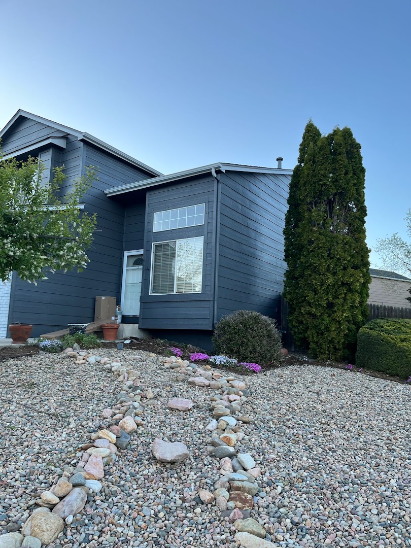 Finished dark blue Colorado home exterior